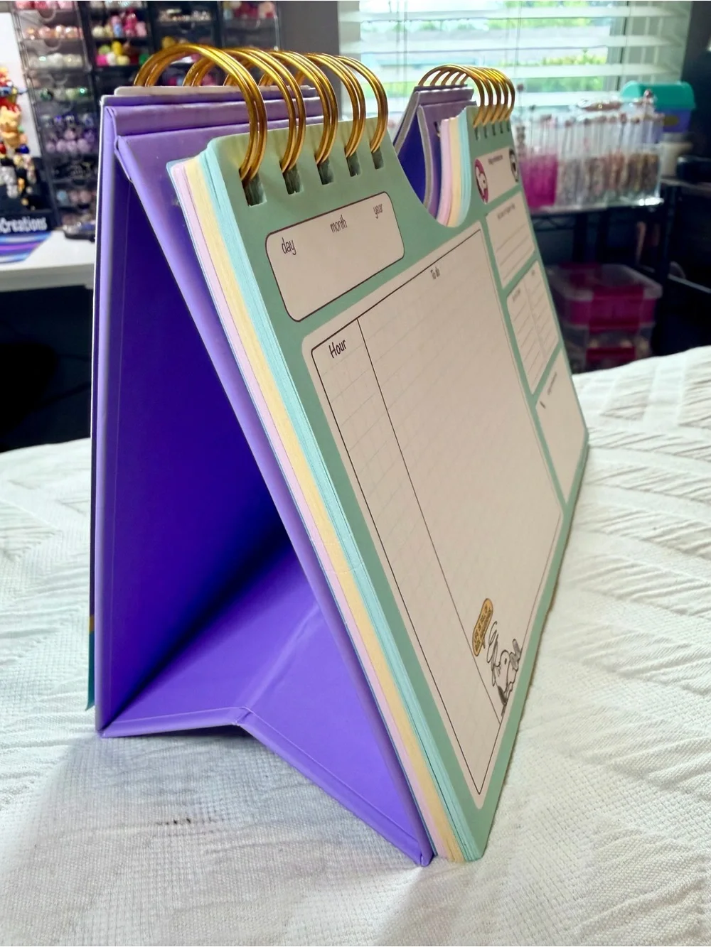 Peanuts Desk Calendar — Purple Cover with Teal Logo